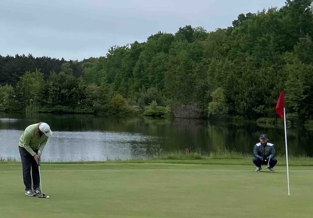 Jaacob Bowden Putts For Birdie During the Adidas State Pro-Am at Boyne Highlands Hills Golf Course