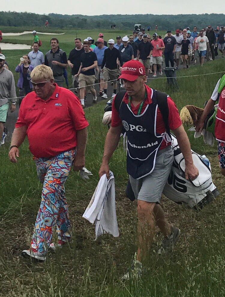 John Daly and Jaacob Bowden have a chat during the 2017 Senior PGA Championship